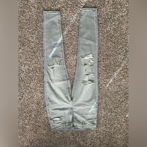 Grey American Eagle ripped skinny jeans